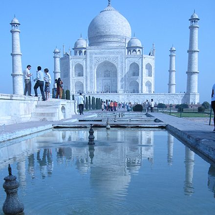 Taj Mahal with people visiting